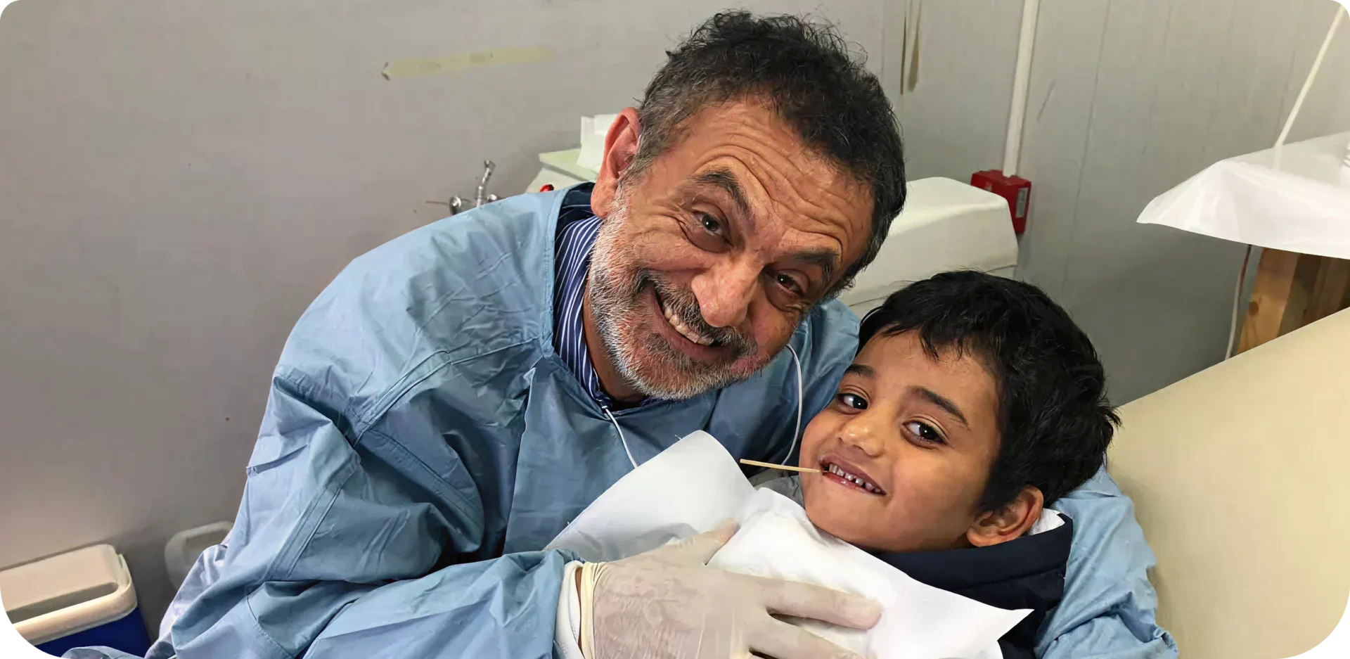 Medical professional comforting child